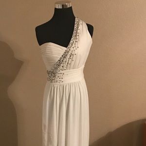 Formal one should long dress. Side slit